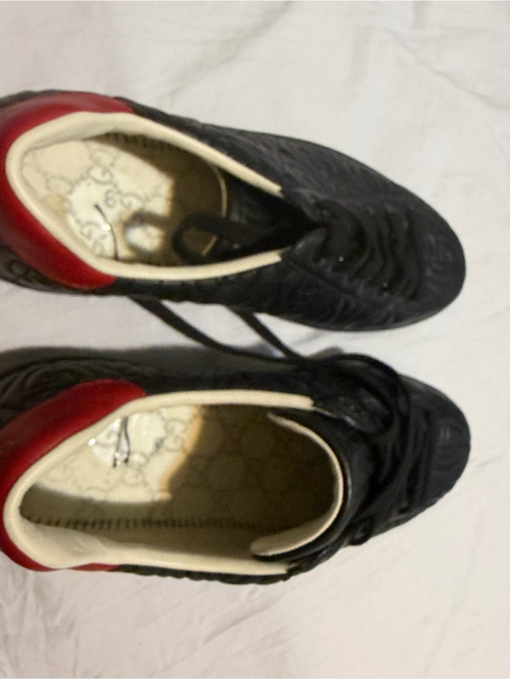 Gucci Black Sneakers with Red Heel Accent